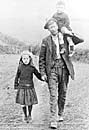 A miner walking home with his children